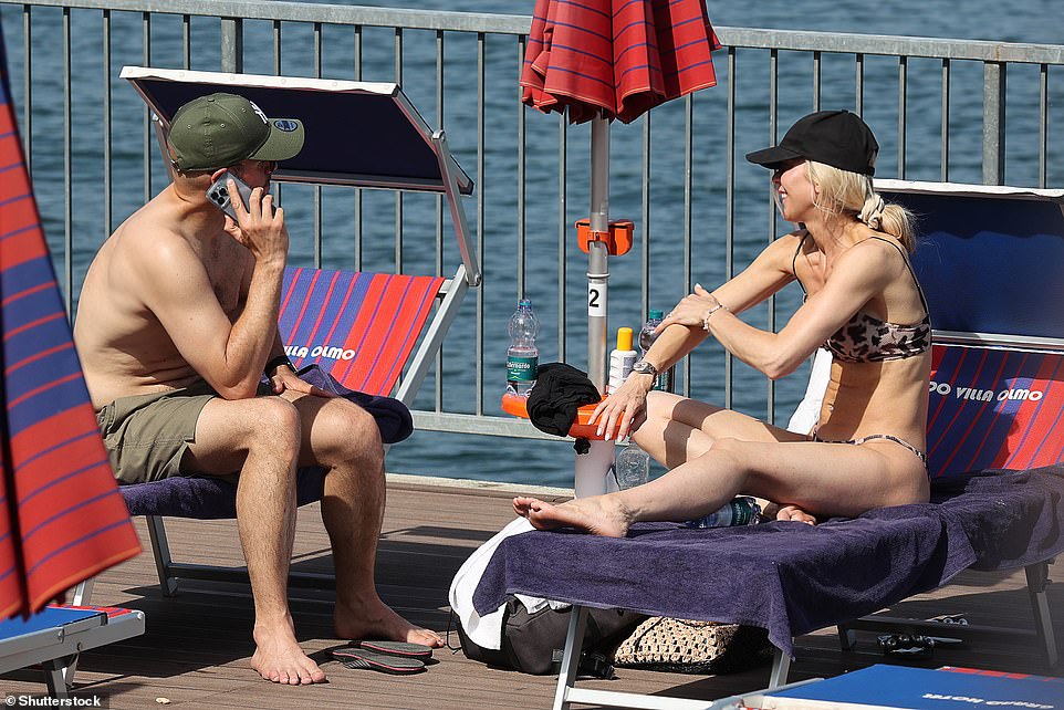 Shade: Both Kate and Martin wore baseball caps to shield their faces from the blazing sun