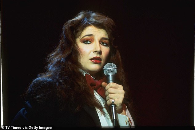 Musician Kate Bush performing live in 1978. She returned to the top of the charts this week