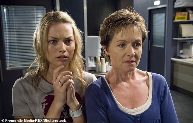 Robbie says Neighbours was 'brilliant training' for her Hollywood career and admits she could never learn lines at the speed to she used to during her soap days. Pictured here in 2009 with co-star Jackie Woodburne