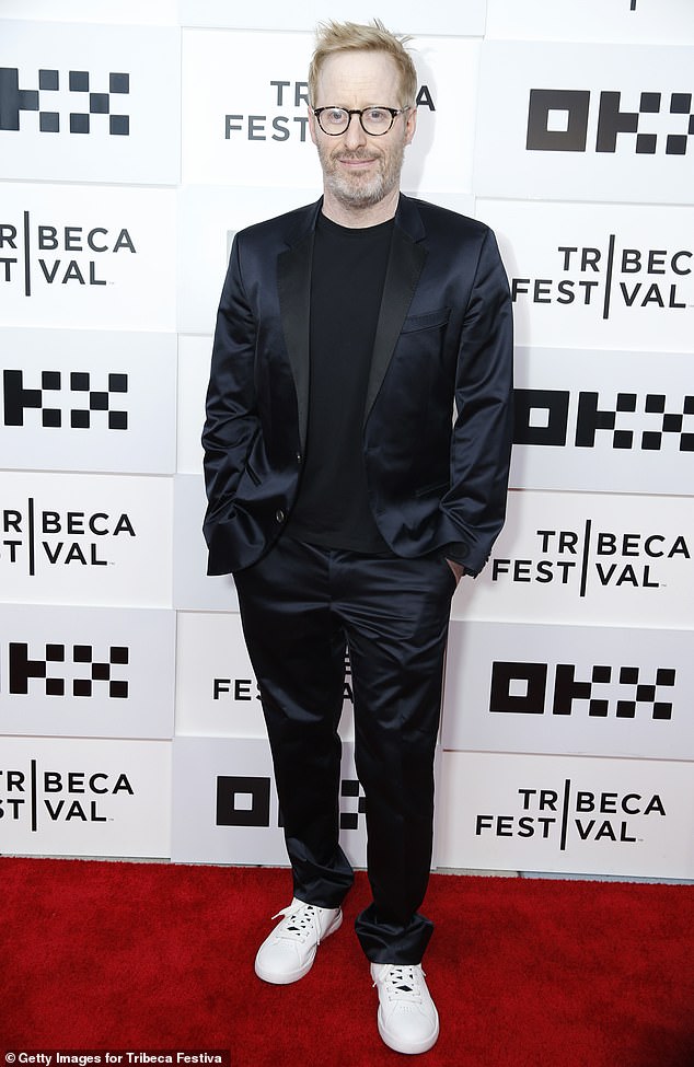 Stylin'! Josh Alexander, 47, who directed the Loudmouth documentary, wore a slick black suit