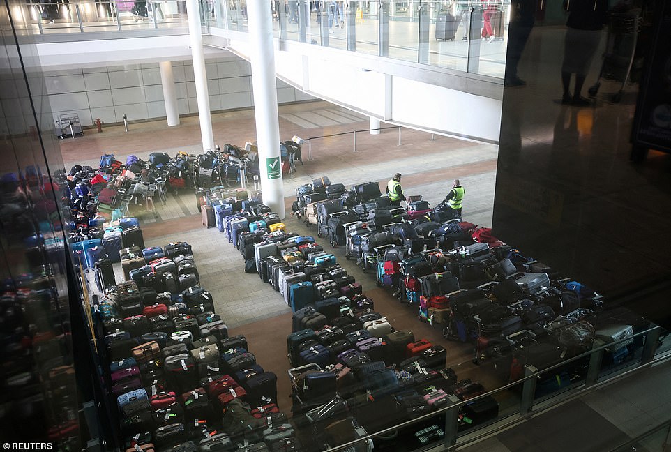 Heathrow seems to have run out of storage space within Terminal 2, with bags spilling outside as staff members monitor them