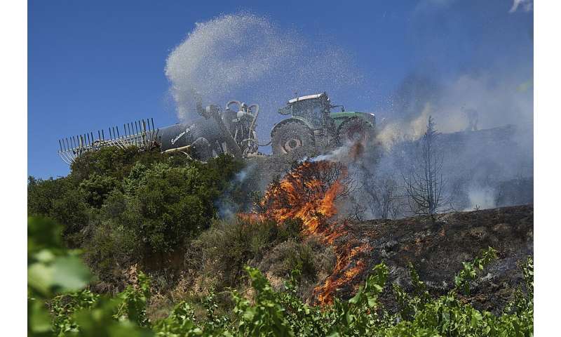 Spain, Germany battle wildfires amid unusual heat wave