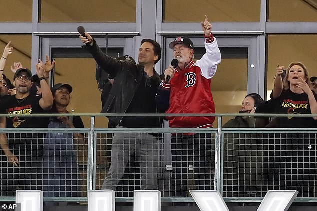 The Rock and Roll Hall of Famer was seen donning a red Red Sox letterman jacket as he sang his classic alongside Broadway star Will Swenson