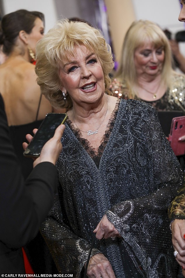 Patti and Bert's daughter Lauren gave her mother a silver 'Bert' necklace to wear on the night, while she wore one of Bert's cummerbund's over her dress