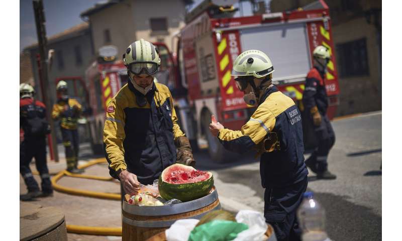 Cooler weather helps Spain with fires; rain helps in Germany