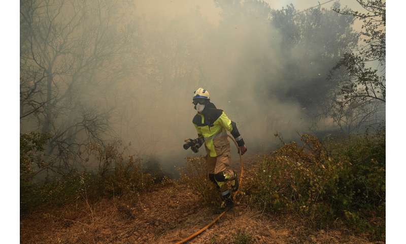 Cooler weather helps Spain with fires; rain helps in Germany