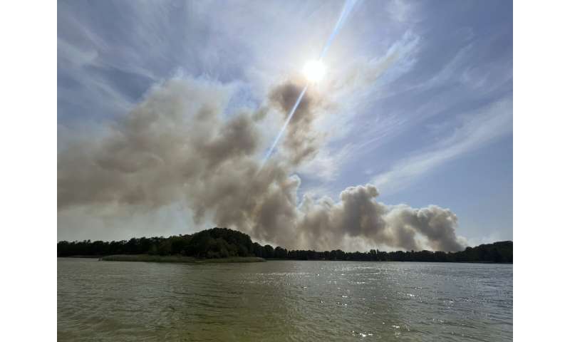 Cooler weather helps Spain with fires; rain helps in Germany