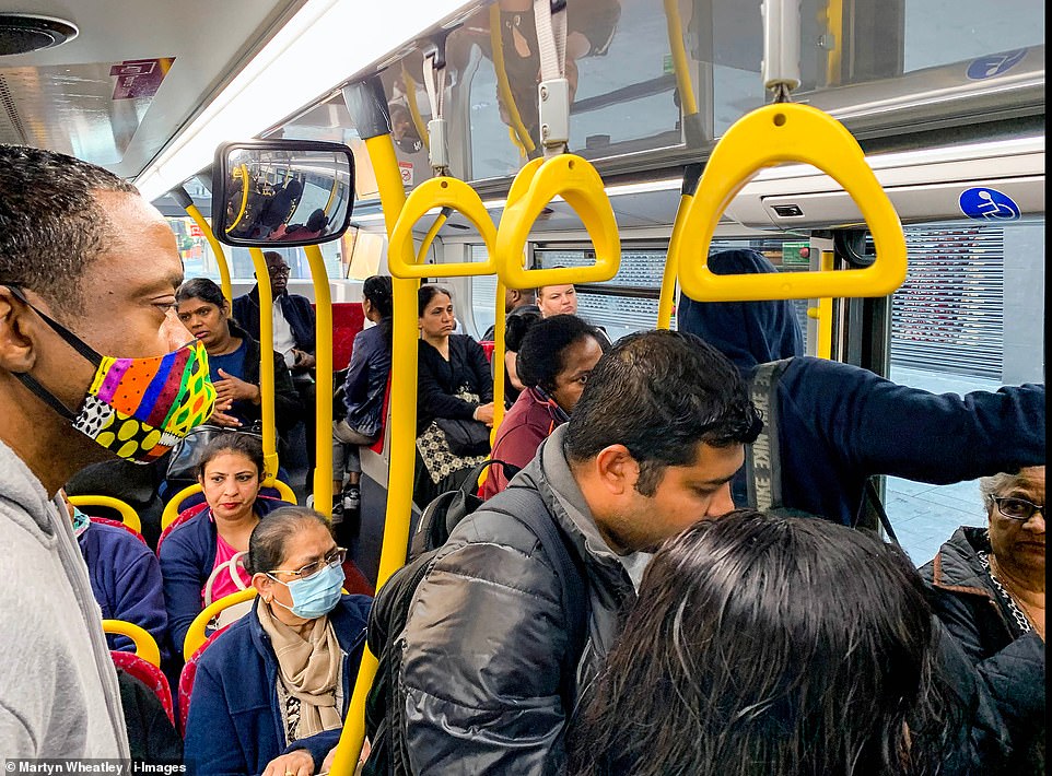 A crowded bus in London at 5.30am this morning as people struggled to get to work and school due to a lack of trains