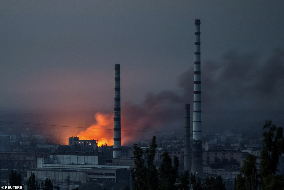 Smoke and flame rise after a military strike on a compound of Severodonetsk's Azot Chemical Plant in Ukraine