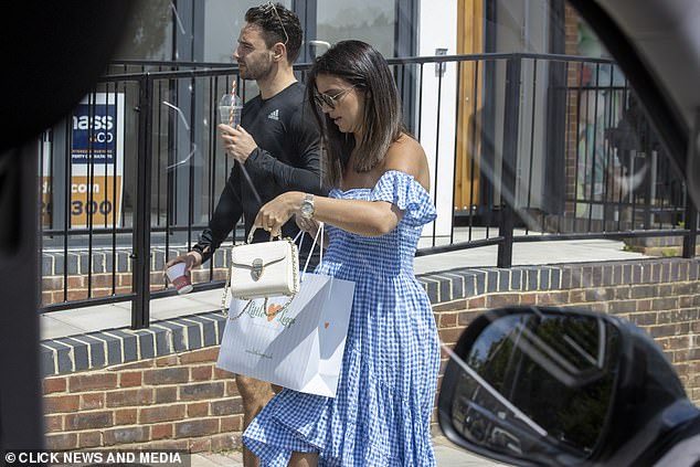 Time for a walk! The trio briefly stopped to grab a coffee on the high street while enjoying their sunny stroll