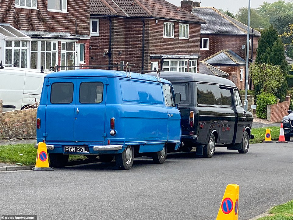 Vintage: Vans were seen parked on the street as filming continued on the drama