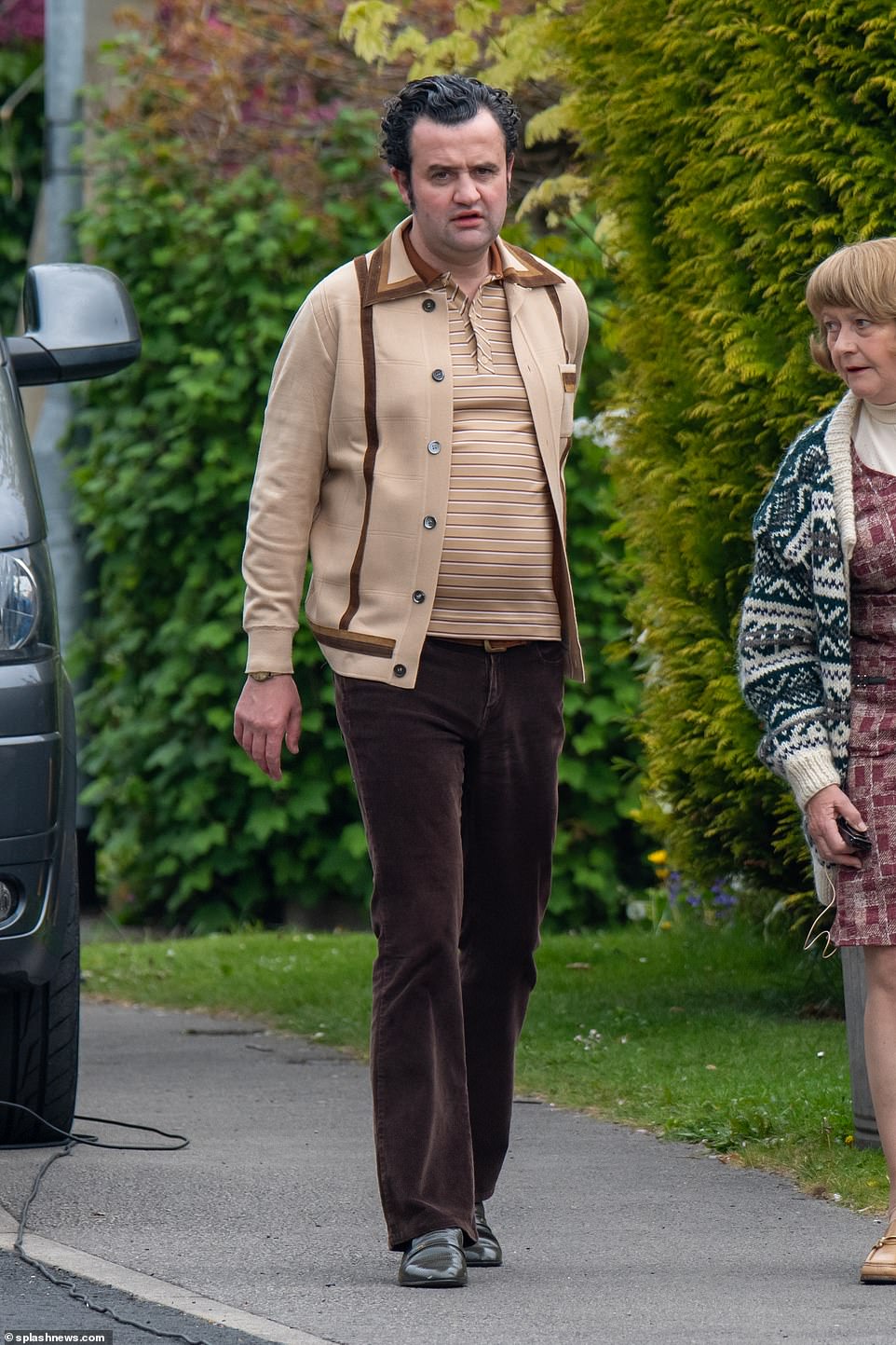 Scenes: Daniel wore chestnut flares and a tan shirt as he filmed for the drama recently