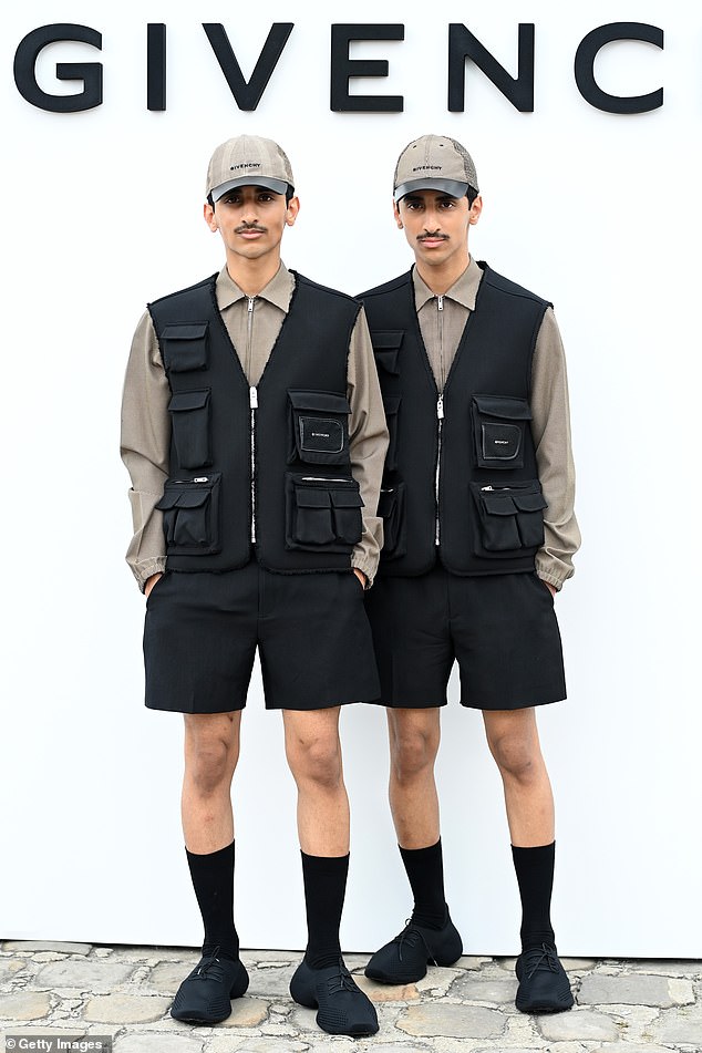 Seeing double: Twins Humaid Nadban and Mohammed Nadban wore identical outfits, made up of black gilets over taupe jackets, and paired with black shorts