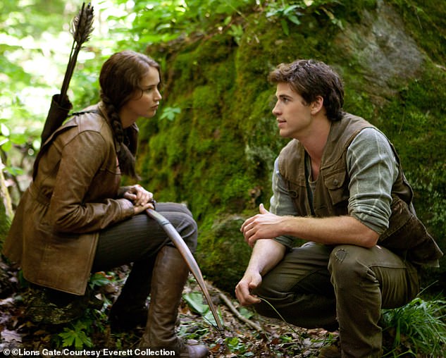 Franchise: The first four Hunger Games films, starring Jennifer Lawrence (L) and Liam Hemsworth (R), received mostly good reviews and amassed a total $2.9B at the global box office between 2012-2015