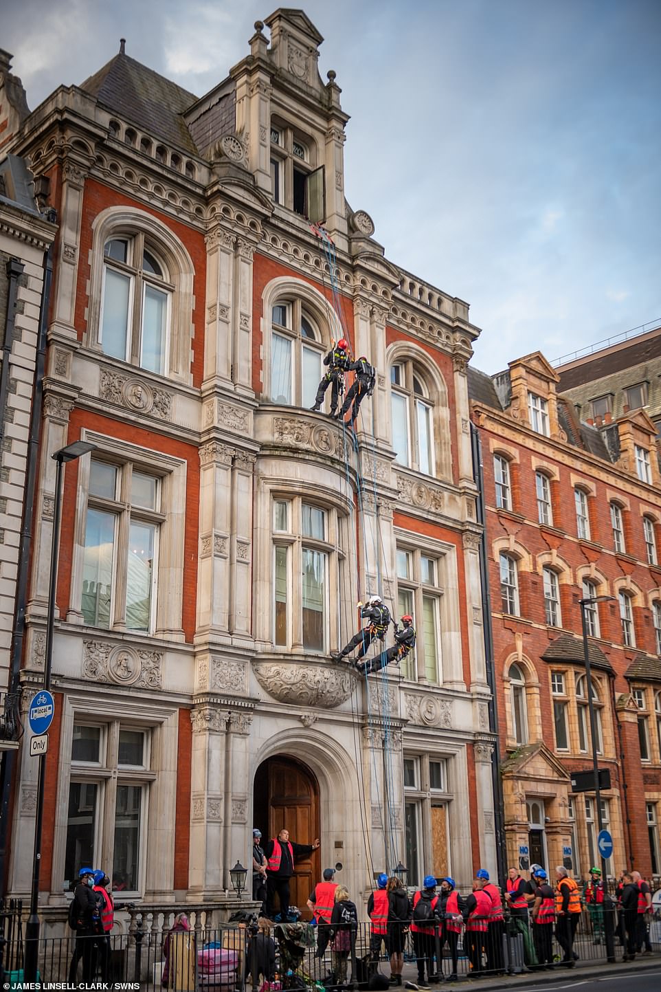 The team of ex-special forces veterans roped down the front of the stunning property so that the squatters didn't try and jump from the windows