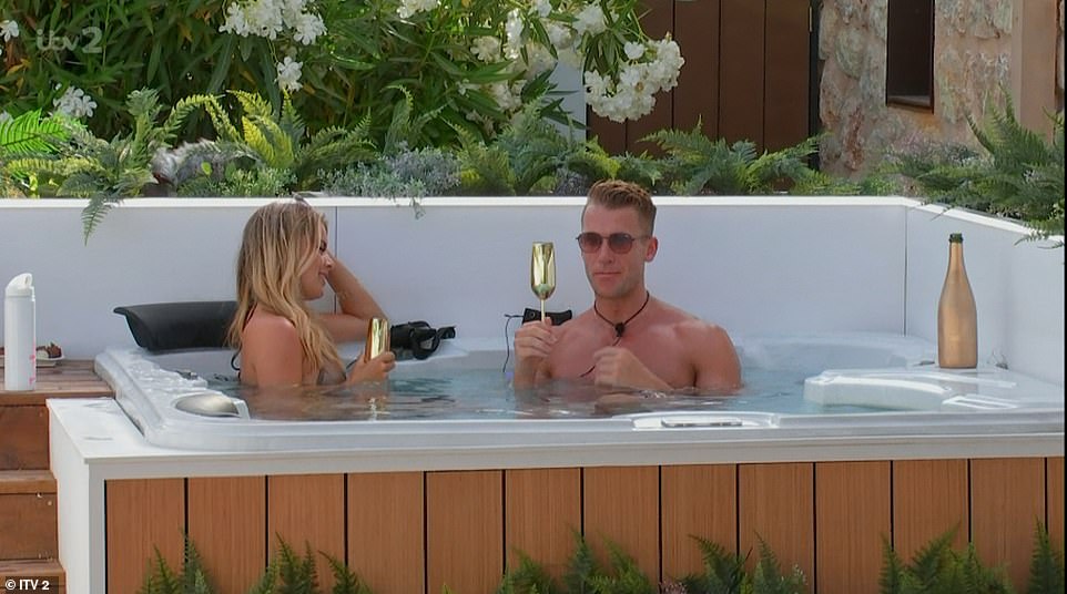 Charlie received a text telling him he could choose two girls to go on a date with and he selected Ekin-Su and Tasha, who seemed quite smitten with him after they got to know each other in the hot tub.