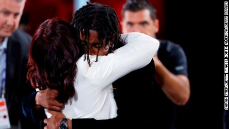 Jaden Ivey hugs his mother Niele after being drafted with the fifth overall pick by the Detroit Pistons during the 2022 NBA Draft.