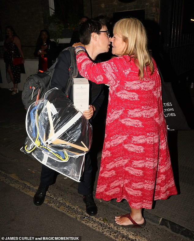 Calling it a night: She appeared to be saying her goodbyes at the afterparty, leaning in to give TV personality Linda Robson a hug before departing