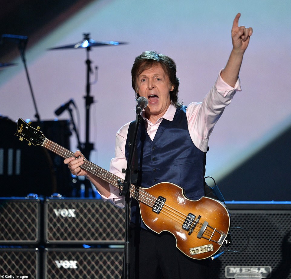 Paul McCartney, 80, (pictured playing in 2014) will headline Glastonbury's famous pyramid stage at 9:30pm on Saturday June 25