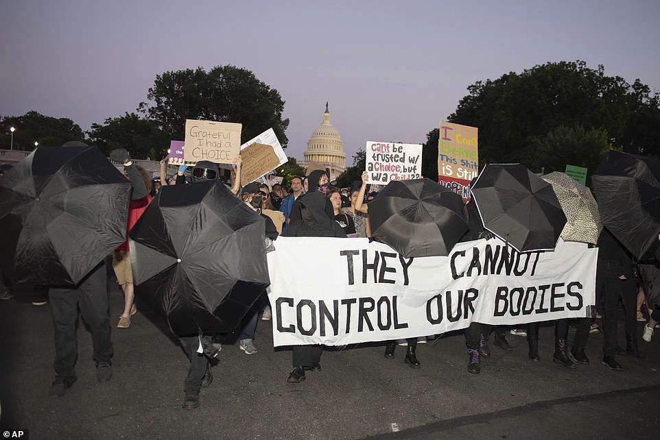 People in Washington, Chicago and other cities also marched Friday evening