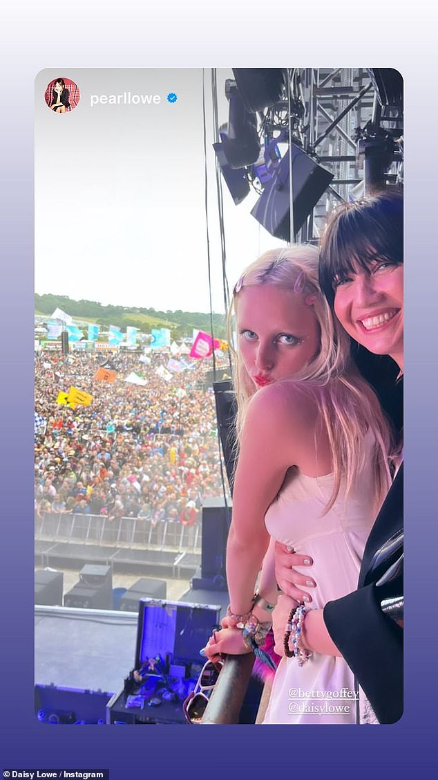 Supportive family: Daisy's mum, Pearl, was also backstage to support her drummer husband Danny Goffey - as she shared a Story of two daughters Daisy and Betty Goffey sharing a sweet hug together