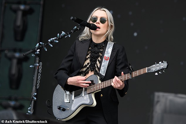 Making a statement: The singer donned a sparkly crop top and a black trouser suit for her performance in the capital