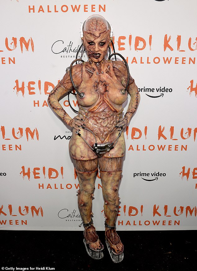 Gross: In 2019, Heidi debuted her most grisly costume - an alien with an exposed brain - for her 20th annual Halloween bash held at Cathédrale New York