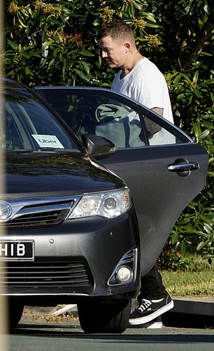 Carney dressed casually as he left his Benowa Waters home