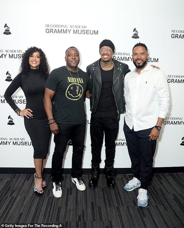 All black: The Wild 'n Out host, 41, rocked a black leather jacket and posed with panelists Tina Marie Tyler, Eric Brooks, and Adrian Miller on the red carpet