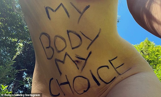 Posting to Instagram on Sunday, the Australian model, 33, posed nude with 'my body my choice' written across her stomach. In her caption, the mother-of-one described how she was forced to terminate a pregnancy that posed a risk to her life