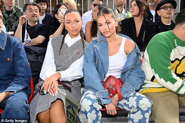 Enjoying the show: Thylane wore her silky chestnut tresses up in a slicked back ponytail, leaving out a few face framing strands