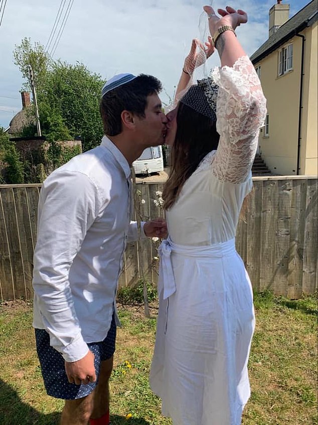 On the date of their original wedding the couple held a fake one in their garden, complete with a fake veil and some glasses of bubbly