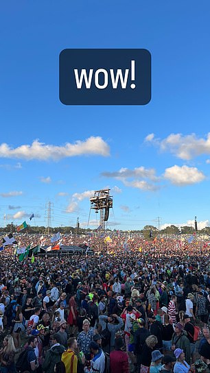 Wow! Christian appeared in awe as he snapped a shot of the crowd