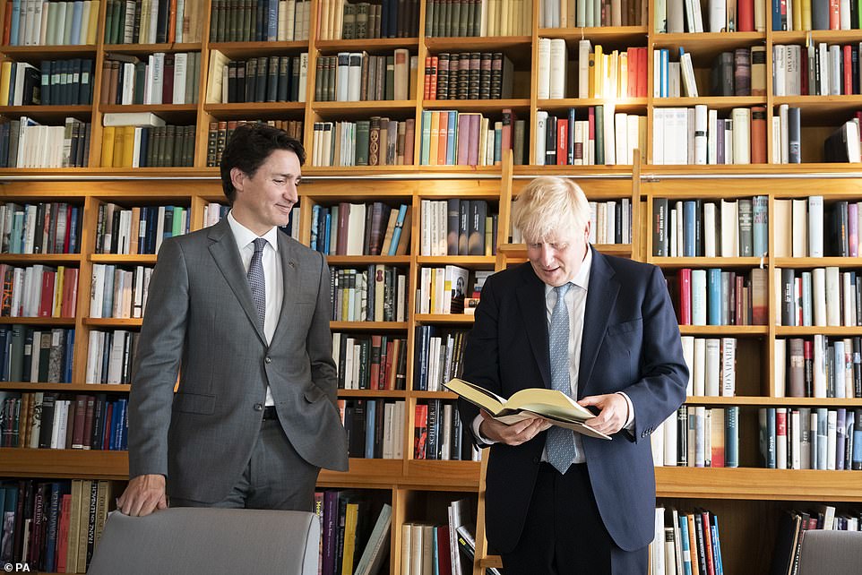 Boris Johnson with Justin Trudeau  in the holding room ahead of the official welcome ceremony during the G7 summit in Schloss Elmau