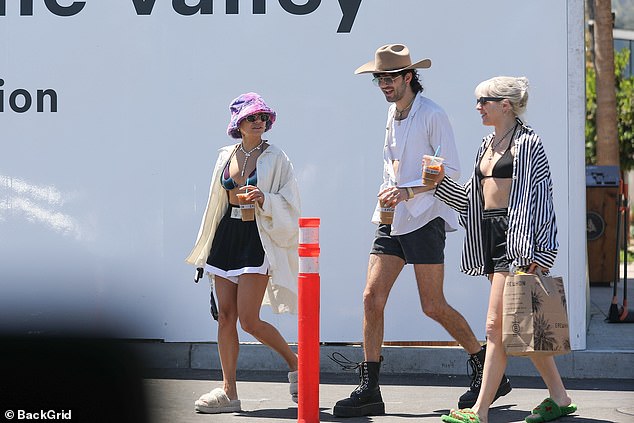 Comfortable clothing: The Spring Breakers cast member also rocked a set of high-waisted athletic shorts and a pair of fuzzy slippers