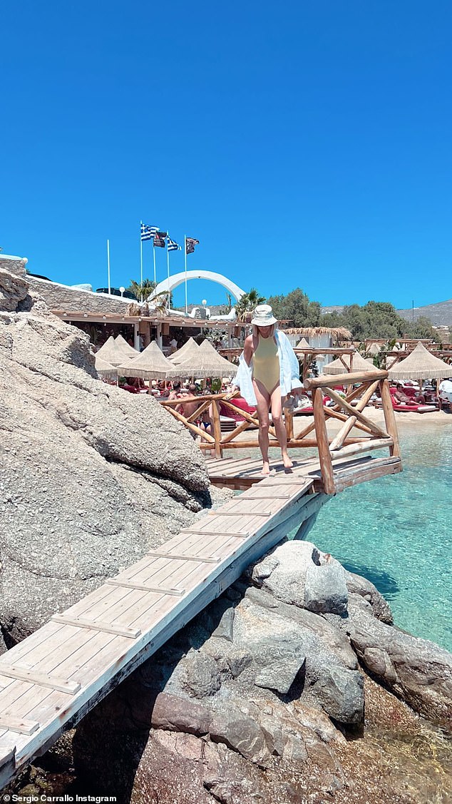 Stunning view: In a series of social media photos and videos, a swimsuit clad Caroline smiled warmly while soaking up the sun on the shores of the Mediterranean