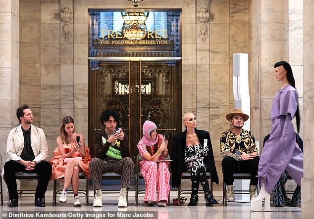 Glitterati: The platinum blonde Texan took her seat between Kat and Char near YouTube's head of fashion/beauty Derek Blasberg (L), The Fashion Guitar creative director Charlotte Groeneveld (2-L), and Japanese influencer Kemio (3-L)