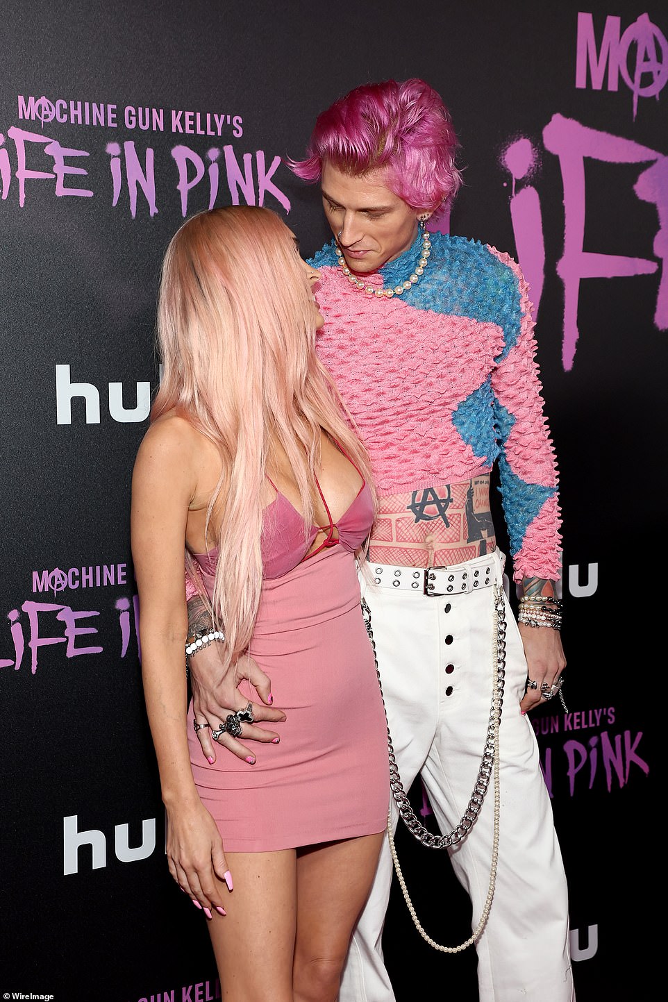 The look of love: The pair gave each other a tender look while posing for photographers