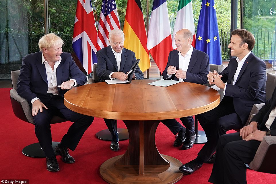 Prime Minister Boris Johnson, US President Joe Biden, German Chancellor Olaf Scholz and President of France Emmanuel Macron during a 'quad' meeting at the G7 summit at Elmau Castle