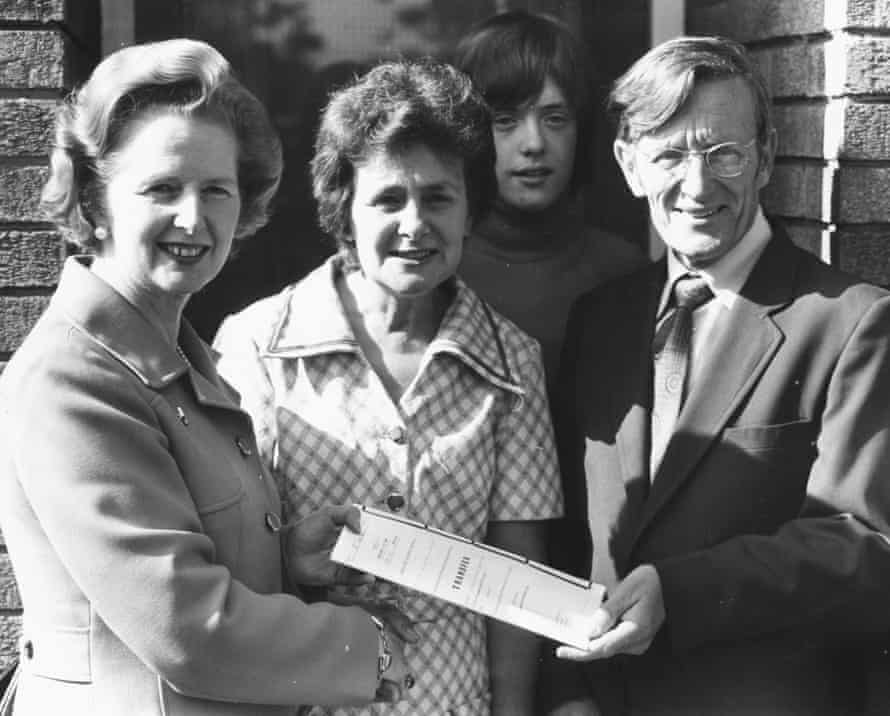 Margaret Thatcher, as leader of the opposition in 1978, handing the deeds of a council house over to its new owners in Balham, south London.