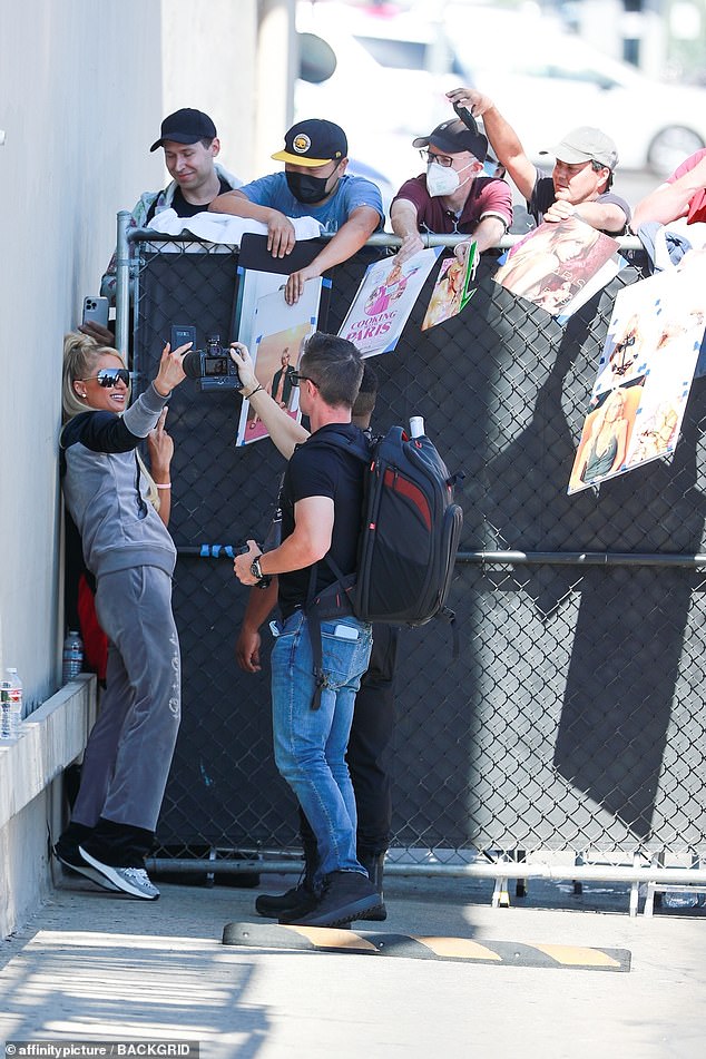 Fan service: Before heading inside for tape her segment, the Paris In Love star took the time to sign autographs for fans