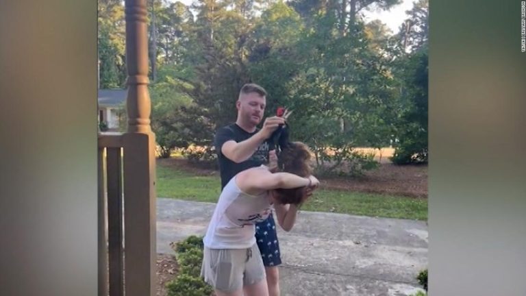 Baby woodpecker gets tangled in woman's hair. See what happened next