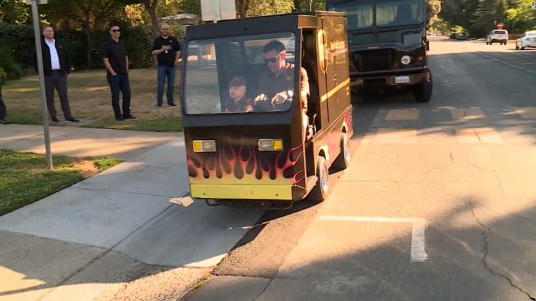 7-year-old boy surprised with mini UPS truck