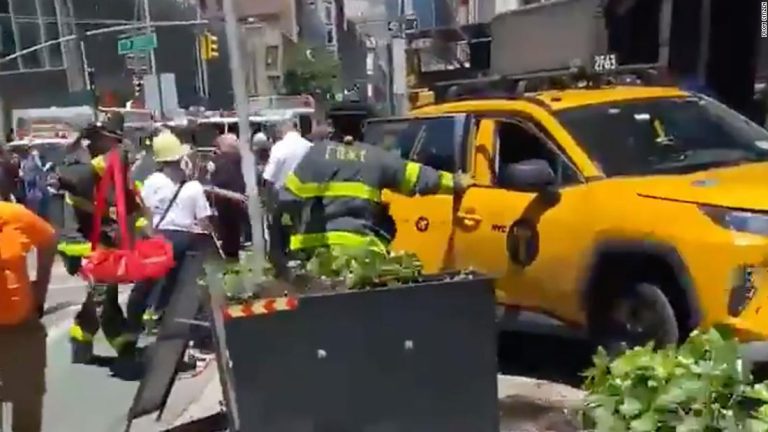 6 people hospitalized after taxi jumps curb in New York City, NYPD says