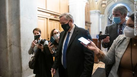 Former White House Chief of Staff Mark Meadows departs the US Capitol following the first day of the second impeachment trial of former U.S. President Donald Trump on February 9, 2021.