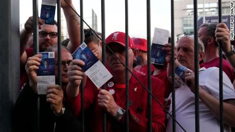 Liverpool fans wait to be admitted to the Stade de France prior to the Champions League final.