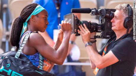 Gauff writes her message on the camera after her victory against Trevisan.