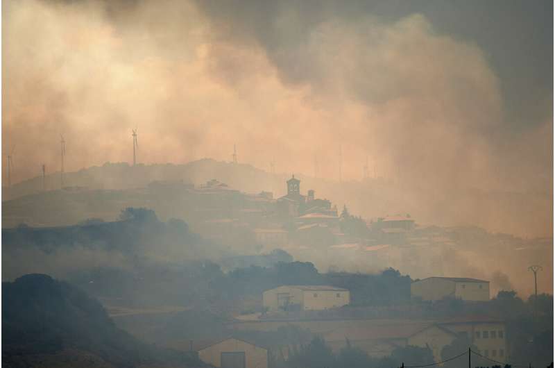 Cooler weather helps Spain with fires; rain helps in Germany