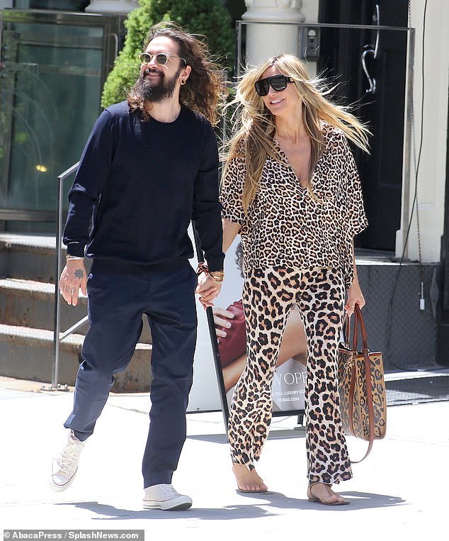 Heidi Klum makes a wild fashion statement as she steps out hand-in-hand with Tom Kaulitz