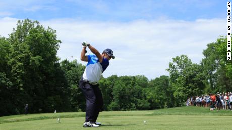 Matsuyama plays a shot on the fifth hole.